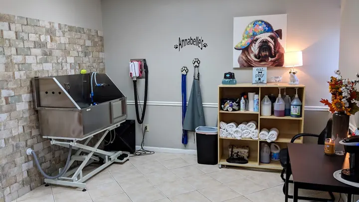 Inside Annabelle’s salon, with the grooming tub and the Annabelle wall sign